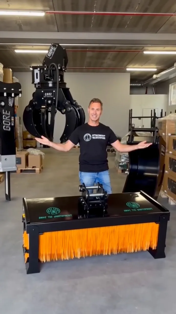 The warehouse with a GORE rotating grapple, a sweeper and loaded pallets in the background